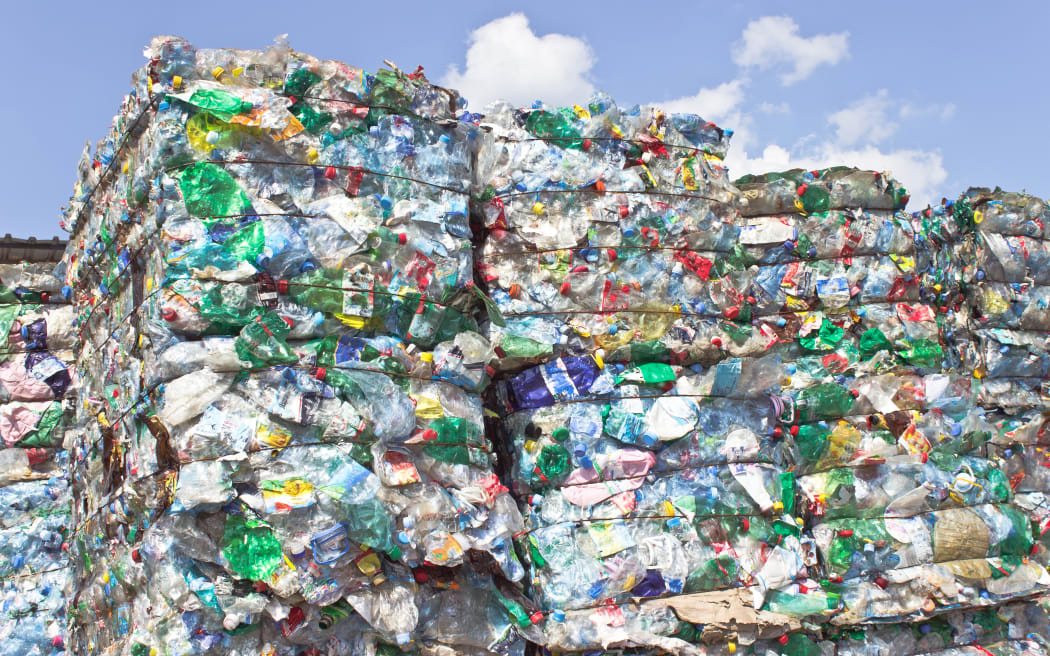 Stack of plastic bottles for recycling.