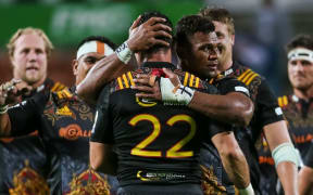 Chiefs centre Seta Tamanivalu hugs Chiefs replacement Stephen Donald after his successful shot at goal during their Super Rugby game vs Western Force at FMG Stadium, Hamilton, on Saturday 26 March 2016.