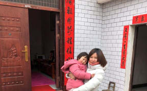 New Zealand resident Lily GAO and her two and half year old daughter Elysse are one of those who stuck in Wuhan.