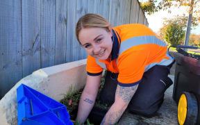 New Plymouth District Council Cadet Kezia Neither helped install water meters as part of the Brooklands pilot in May.