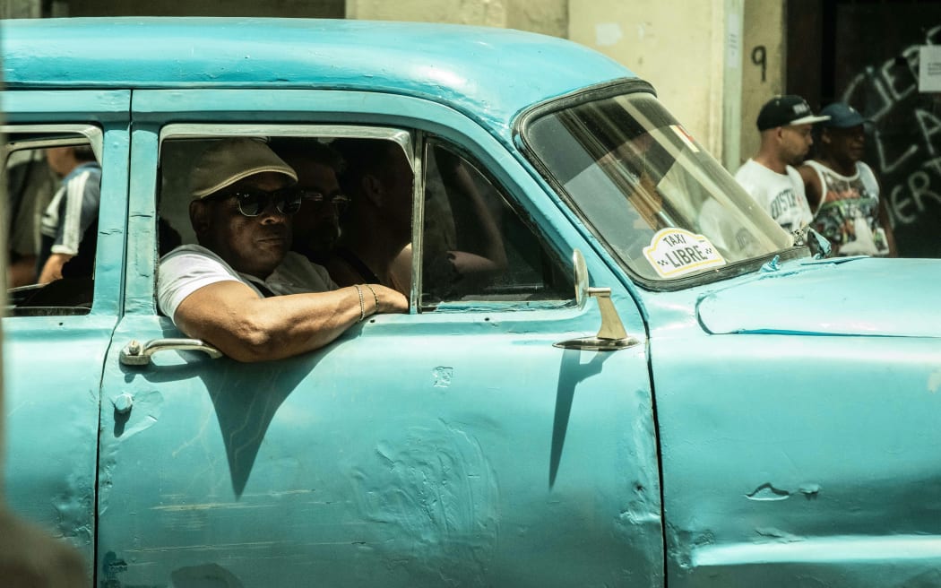 Drivers in Cuba must pick up hitchhikers.