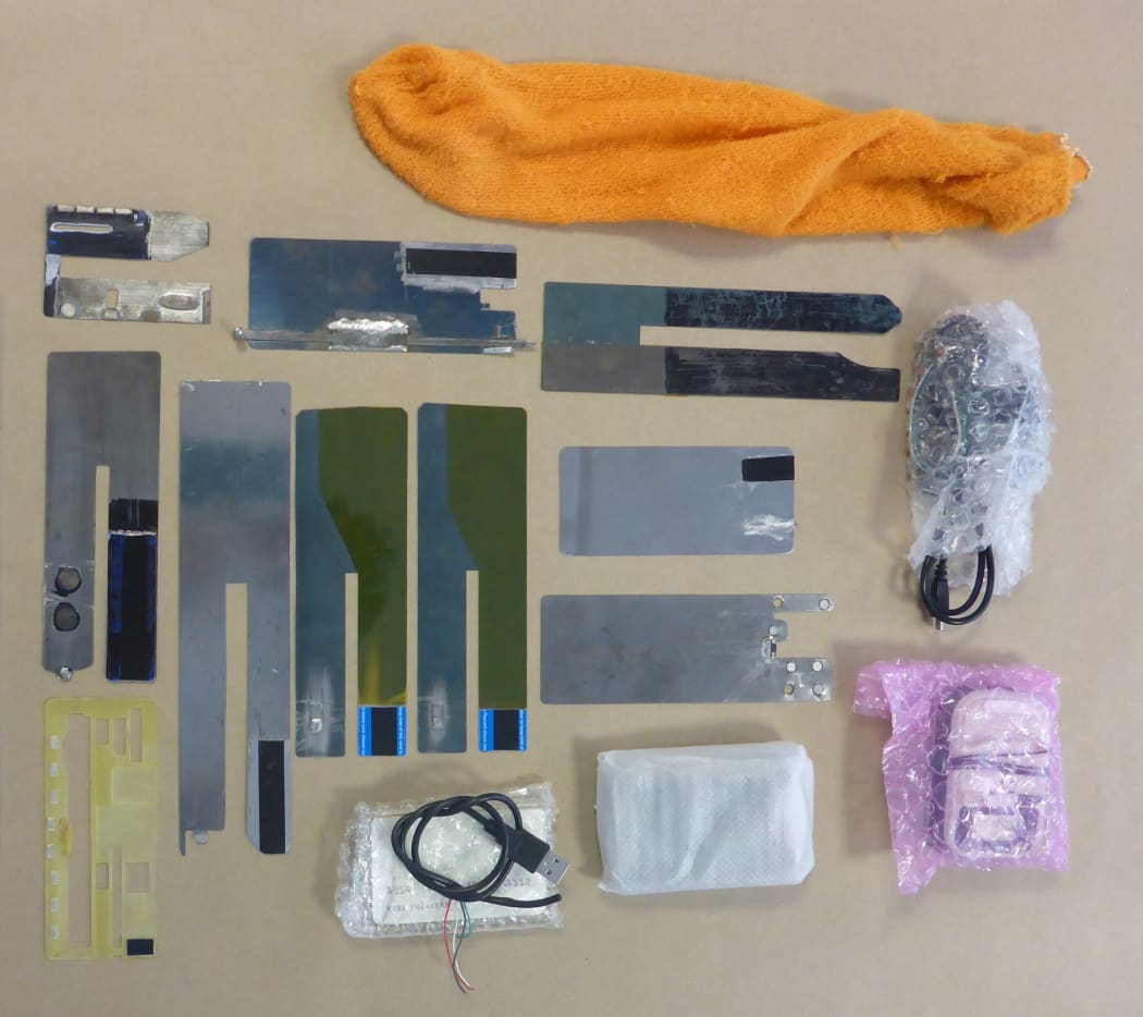 Card skimming equipment found hidden in an orange sock.