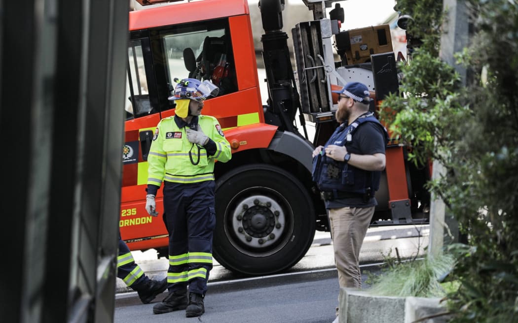 Emergency services gather on Church street in Wellington after reports of an injury in an apartment explosion.