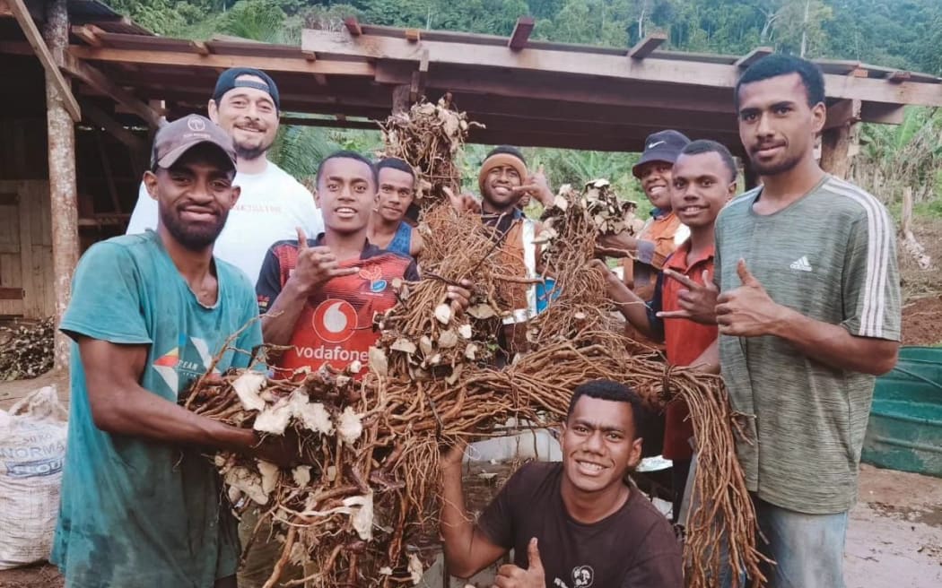 Saimon Lomaloma, back left in white t-shirt, the owner of Wakanavu Kava in Fiji, says the natural remedies space is growing, as people begin to realise kava's health benefits.