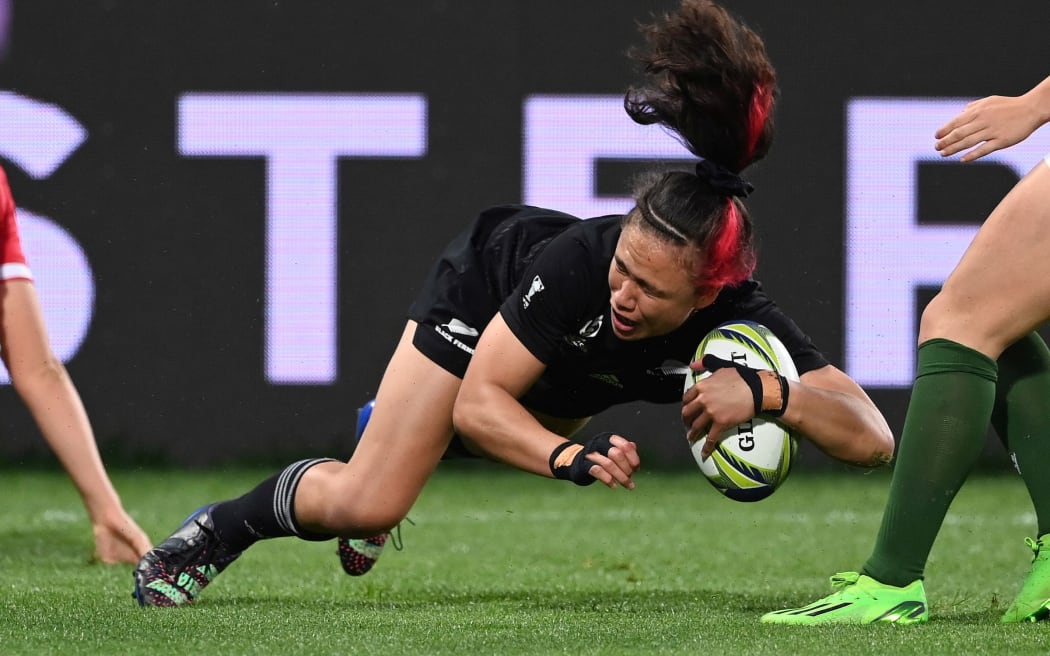 Ruby Tui of New Zealand scores a try against Wales at their Rugby World Cup quarter-final.