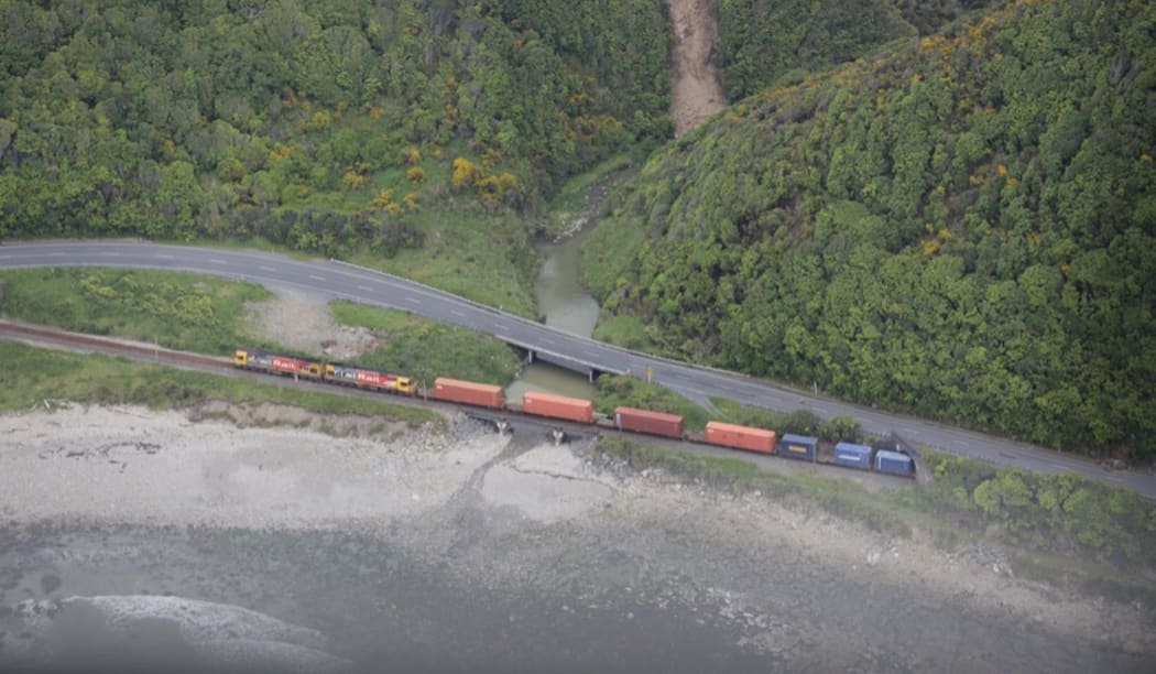 A Kiwirail train is seen on the Kaikoura Coast after yesterday's earthquake.