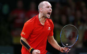 Belgian tennis player Steve Darcis celebrates victory