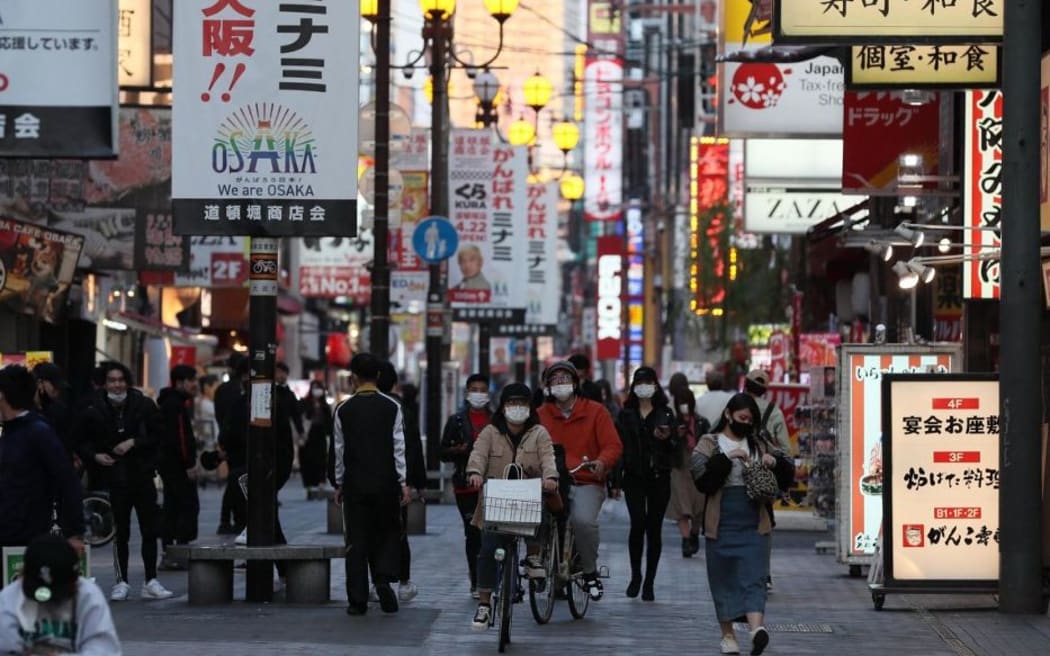 A photo shows restaurant and bar area at Dotonbori district in Osaka City, Osaka Prefecture on April 19, 2021. The number of the new coronavirus COVID-19 patients has been increasing in Osaka Prefecture