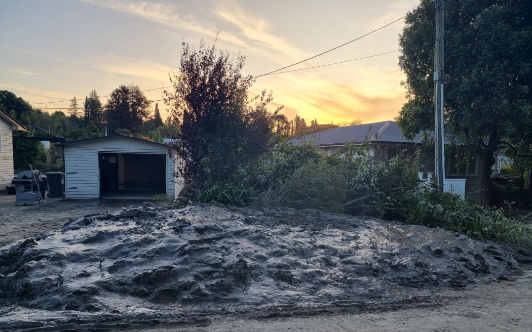 Pictures of Joll Road, Havelock North. The town was largely spared from the cyclone but a small pocket wasn't so lucky. This street backs on to the Mangarau Stream, and was ravaged. A stark contrast to the manicured lawns and neatly trimmed hedges on neighbouring streets.