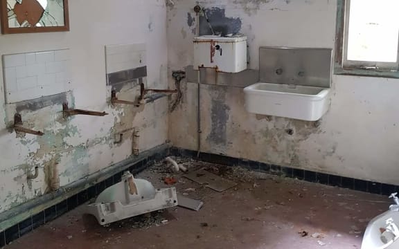 Shattered bathroom facilities at the nurses' home today.