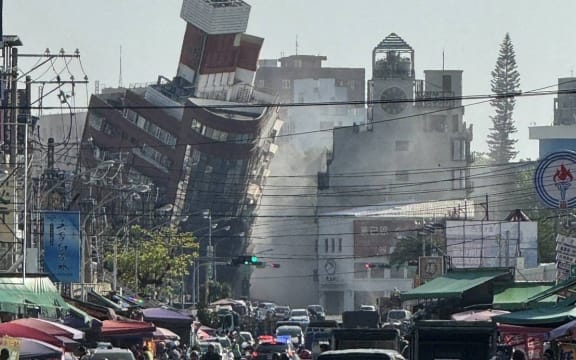 (240403) -- TAIPEI, April 3, 2024 (Xinhua) -- This photo taken on April 3, 2024 shows a damaged residential building in Hualien, southeast China's Taiwan.
  A 7.3-magnitude earthquake jolted the sea area near Hualien of China's Taiwan at 7:58 a.m. Wednesday (Beijing Time), according to the China Earthquake Networks Center (CENC).
  The epicenter was monitored at 23.81 degrees north latitude and 121.74 degrees east longitude, at a depth of 12 km, said a report issued by the CENC. (Xinhua) (Photo by Zhao Bo / XINHUA / Xinhua via AFP)