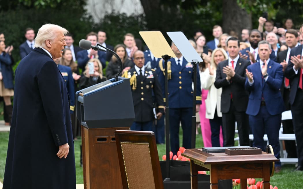 US President Donald Trump arrives to deliver remarks on reciprocal tariffs during an event in the Rose Garden entitled "Make America Wealthy Again" at the White House in Washington, DC, on April 2, 2025. Trump geared up to unveil sweeping new "Liberation Day" tariffs in a move that threatens to ignite a devastating global trade war. Key US trading partners including the European Union and Britain said they were preparing their responses to Trump's escalation, as nervous markets fell in Europe and America. (Photo by SAUL LOEB / AFP)
