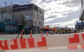 Emergency tape remains at the scene of a fatal fire at Loafers Lodge in Wellington on 16 May, 2023.