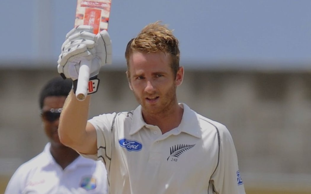 The New Zealand batsman Kane Williamson celebrates his century during day four of the Third and Final Test West Indies v New Zealand at Kensington Oval, Barbados, 2014.