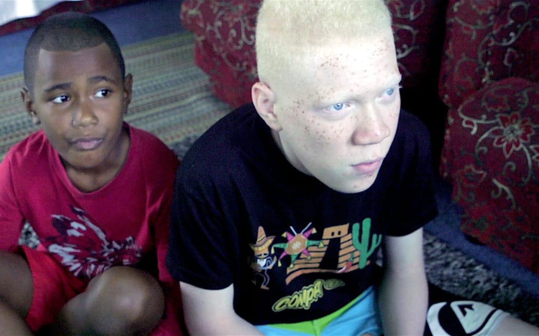 Esala Eseru, 14, features in the film "Coming out of the Shadows."