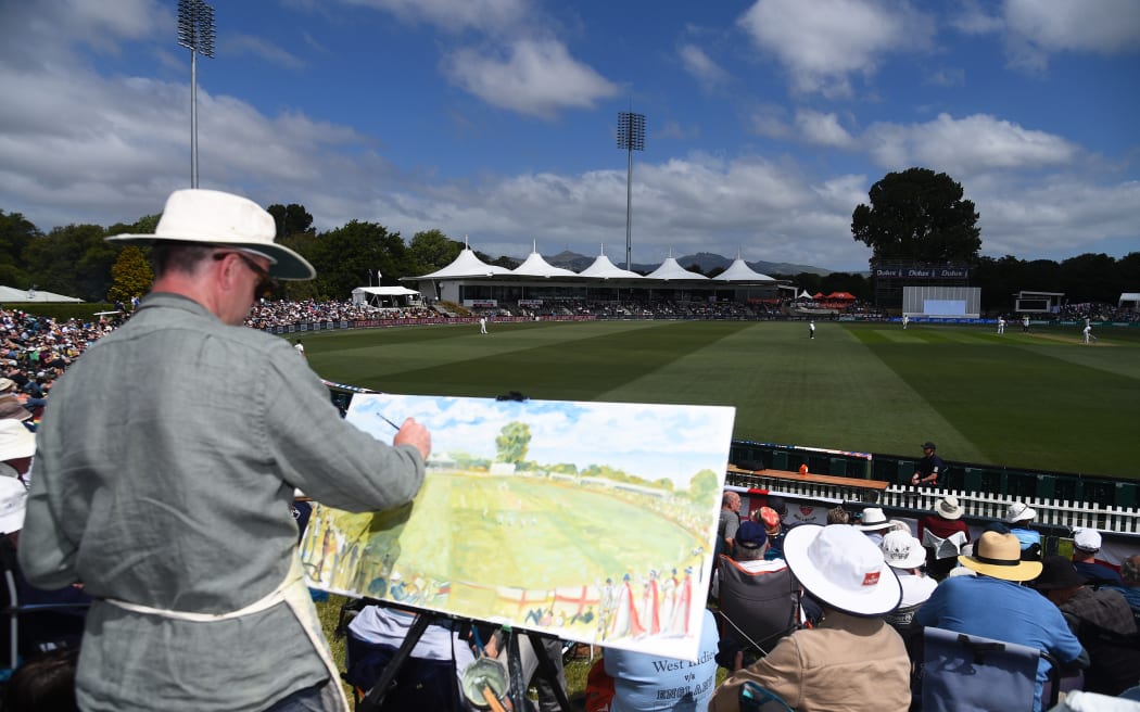 Artist Andy Brown on the second day of the first cricket test between New Zealand and England at Hagley Oval in Christchurch.