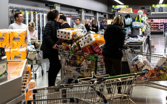 Crowds rush to Countdown supermarket in Grey Lynn, Auckland.