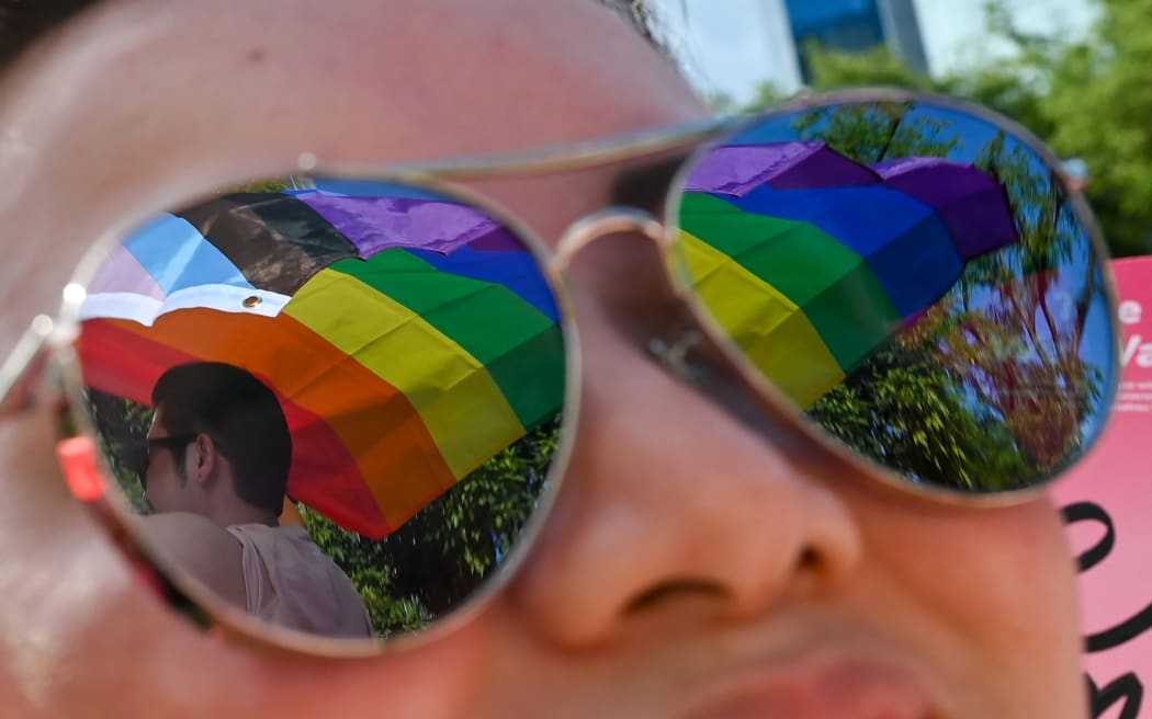 Supporters attend the annual "Pink Dot" event in a public show of support for the LGBT community at Hong Lim Park in Singapore on 18 June 2022.