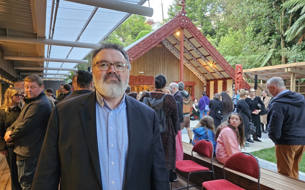 Justice Joe Williams in front of Te Tumu Herenga Waka Marae at Victoria University in Wellington.