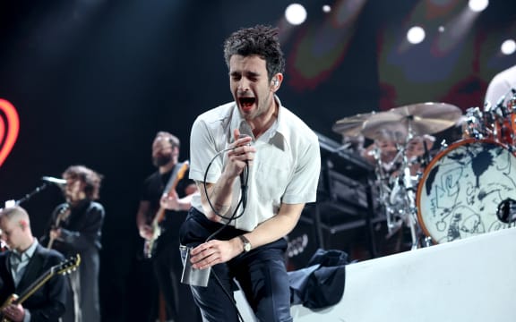 ANAHEIM, CALIFORNIA - JANUARY 13: (FOR EDITORIAL USE ONLY) Matty Healy of The 1975 performs onstage at the 2024 iHeartRadio ALTer EGO Presented by Capital One at the Honda Center on January 13, 2024 in Anaheim, California.   Rich Polk/Getty Images for iHeartRadio/AFP (Photo by Rich Polk / GETTY IMAGES NORTH AMERICA / Getty Images via AFP)