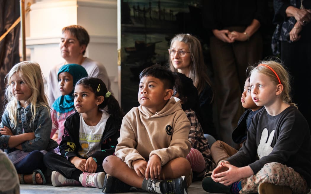 Children listening to a reading of The Wolf and the Hocus Pocus
