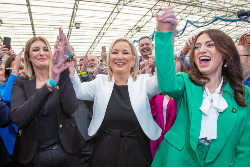 Sinn Fein party MLA member Michelle O'Neill (centre) celebrates with party members after being elected on the first count to the Northern Ireland Assembly.