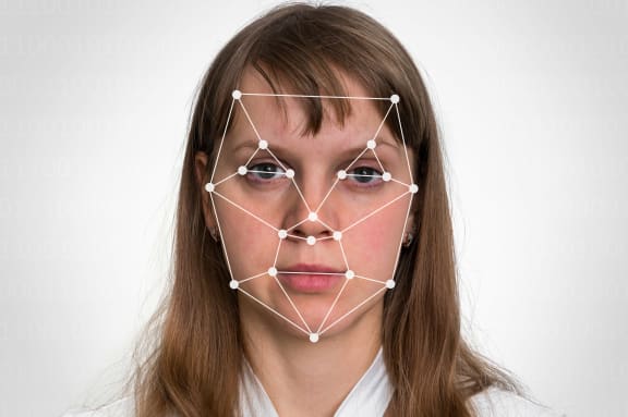 Woman face recognition - biometric verification concept