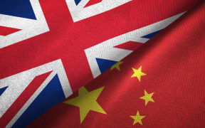 United Kingdom and China flags together relations textile cloth, fabric texture