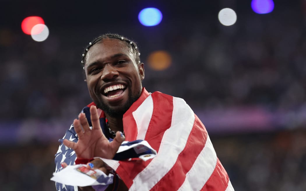 Noah Lyles of United States reacts after winning the men's athletics 100-meter final at the Paris Olympics at the Stade de France in Saint-Denis, France on August 4, 2024.