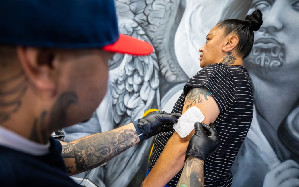 Leroy Roberts of Maia Ink tattooing a client