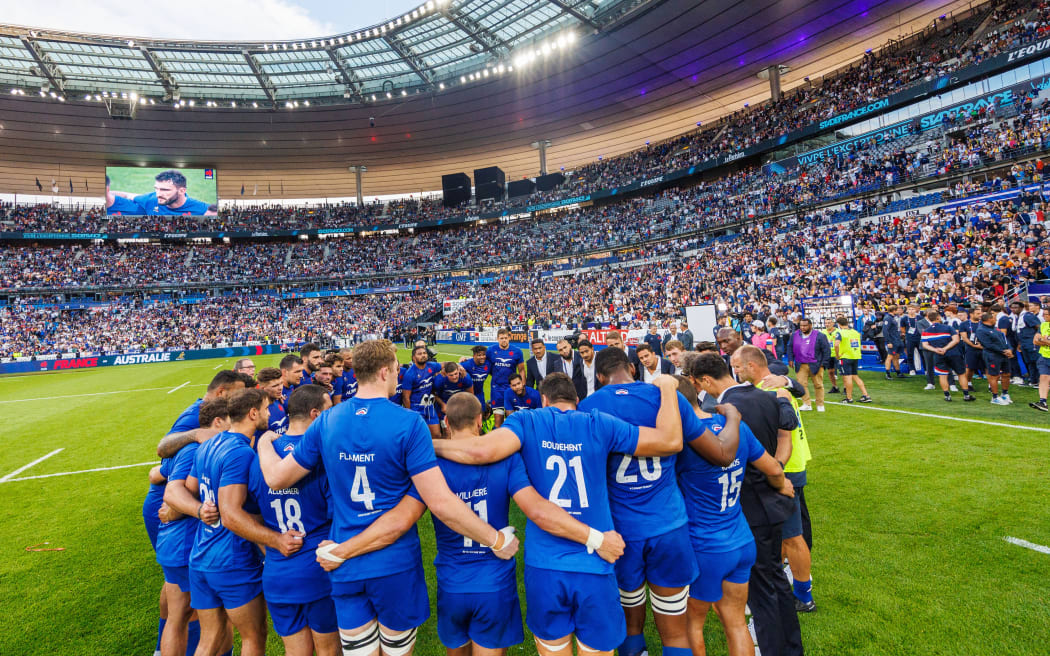 Equipo francés en un grupo en el Stade de France.