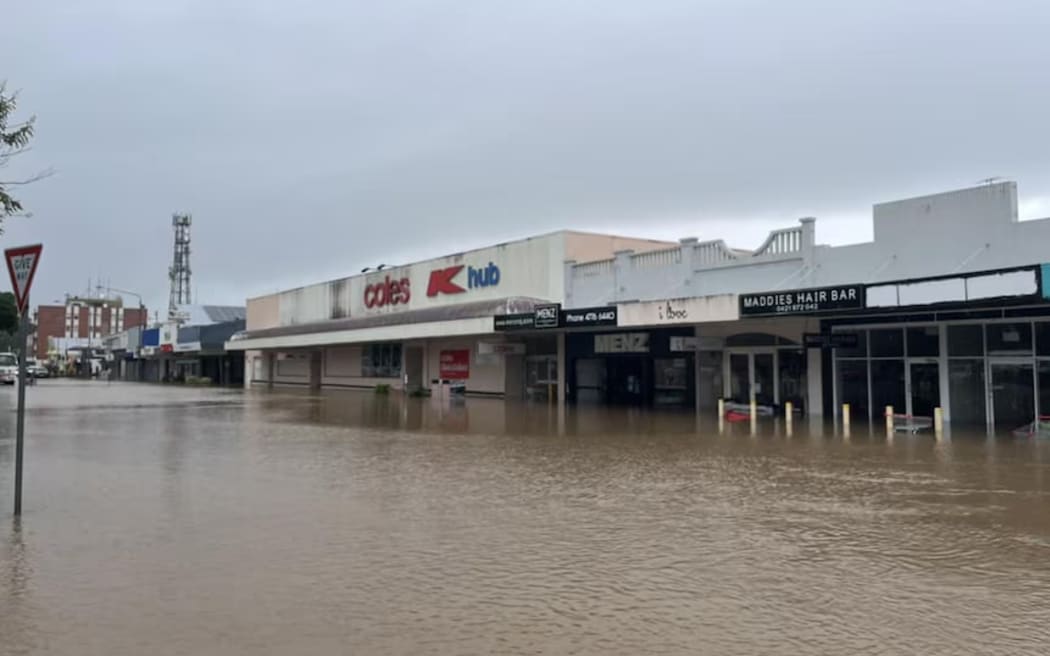 This street in Ingham is entirely flooded. (Supplied: Kieran Volpe)