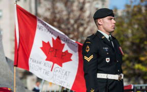 A Canadian soldier standing guard at the National War Memorial during a ceremony there last week.