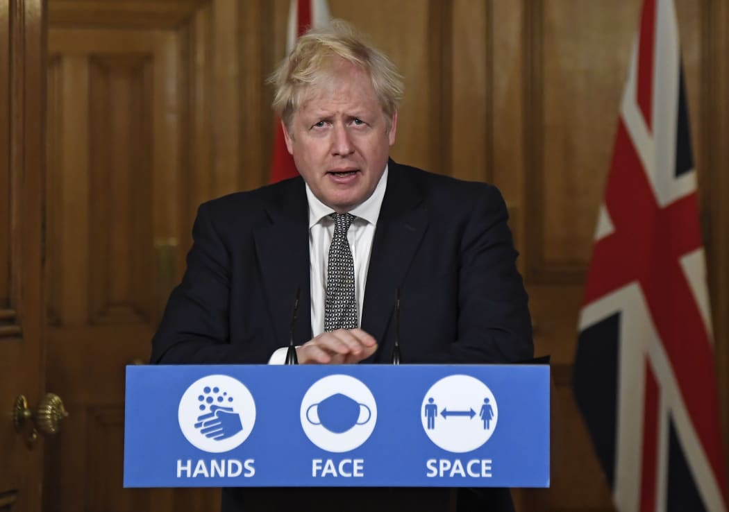 Britain's Prime Minister Boris Johnson speaks during a virtual press conference inside 10 Downing Street in central London on October 31, 2020 to announce new lockdown restrictions in an effort to curb rising infections of the novel coronavirus.
