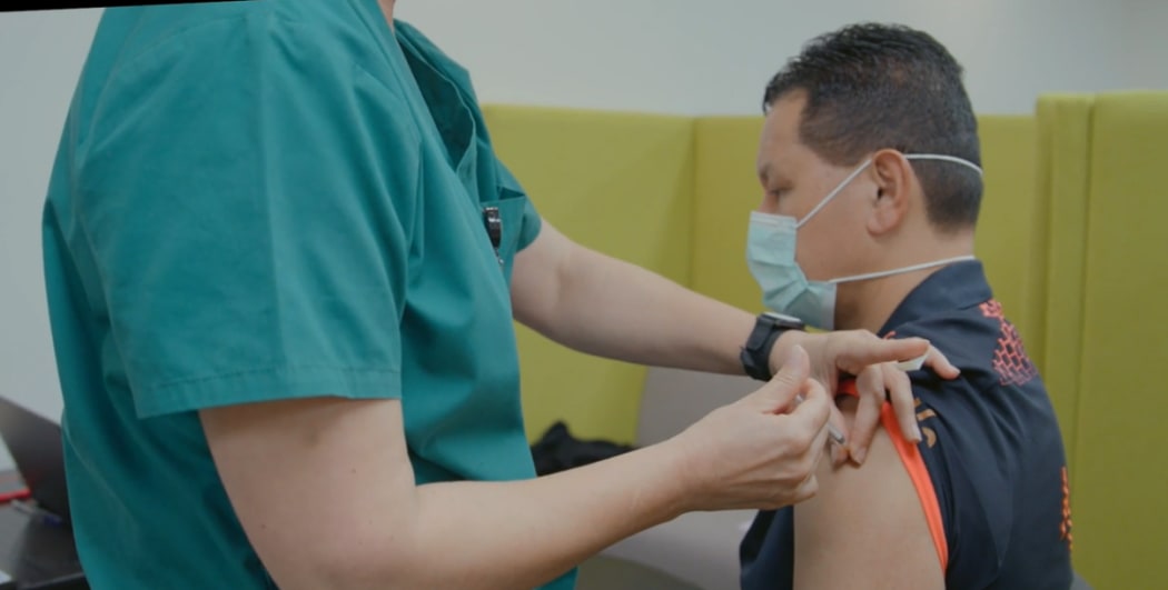 Jet Park operations manager Drew Leafa getting his second Pfizer Covid-19 vaccine.