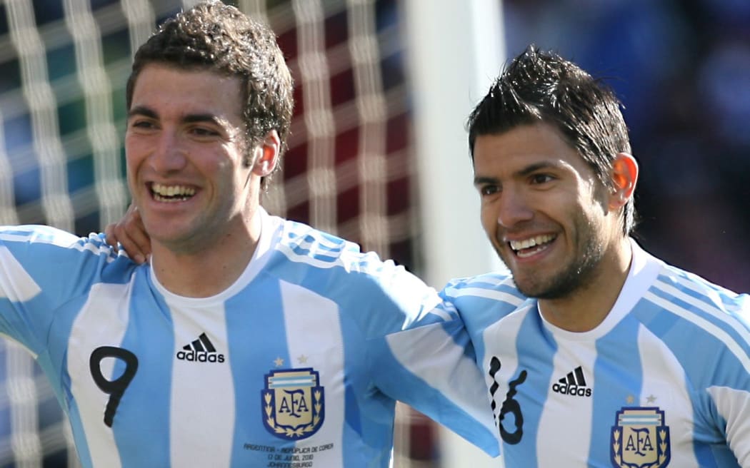 Gonzalo Higuain (L) celebrates with teammate Sergio Aguero after scoring a goal for Argentina.