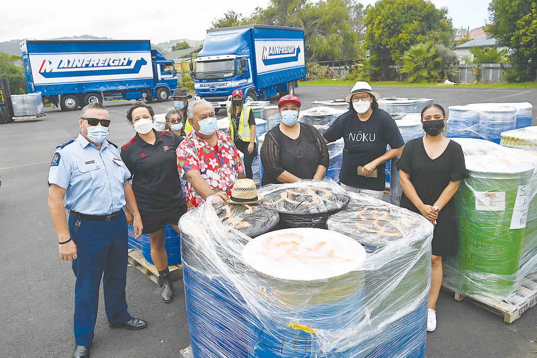 Pictured with a sample of the drums of essential items are (from left) area police commander Inspector Sam Aberahama, East Coast MP and Cabinet Minister Kiri Allan, organisers Pauli and Seini Ma’afu, Ikaroa Rawhiti MP and Minister Meka Whaitiri and organiser Mele Ma’afu Sinoti.