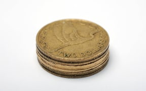 020514. Photo Diego Opatowski / RNZ. New Zealand money. Currency. Two dollars coins.