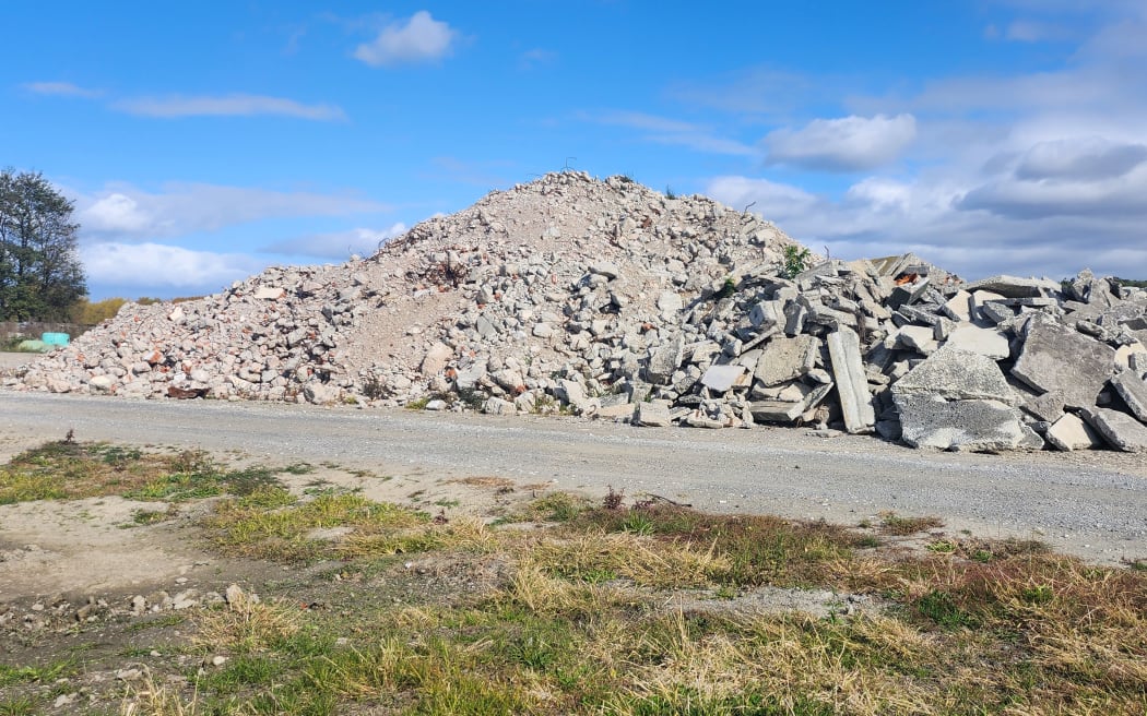 Concrete piled at a 'clean fill' site after Cyclone Gabrielle.