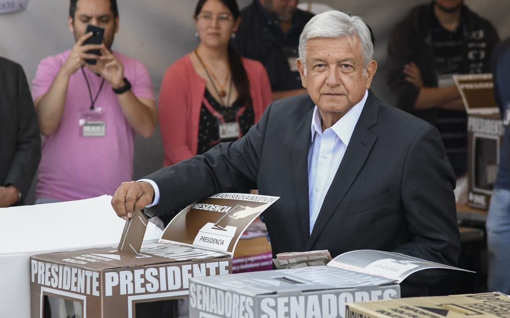 Mexico's presidential candidate Andres Manuel Lopez Obrador for the "Juntos haremos historia" party, casts his vote during general elections, in Mexico City, on July 1, 2018.