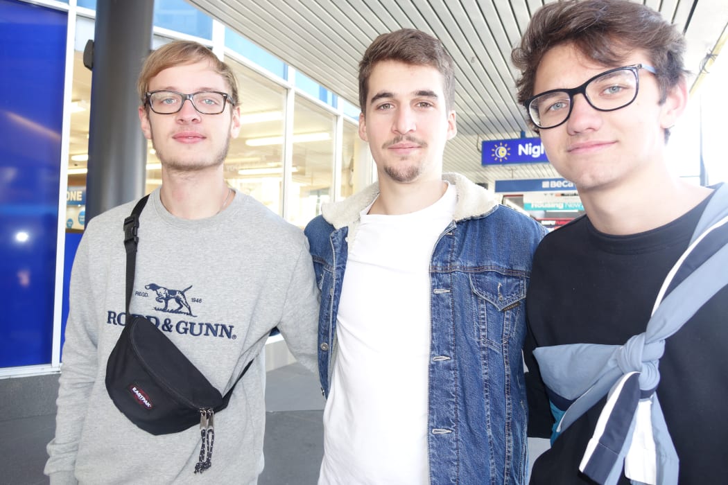 Foreign tourists (left to right) Maks Michels, Matthias Widmer and Till Wittmund say it's unlikely they'd pay $75 a night for a hut in the Abel Tasman.