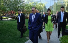 John Key arrives in Beijing with two senior ministers and 40 business delegates.