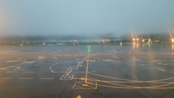 Fog over Wellngton Airport's runway on Thursday morning 30 March 2017.
