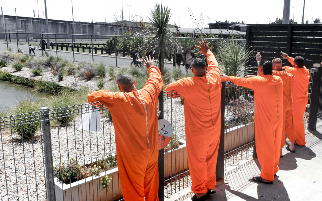 Dads wave goodbye to their children after a 'child centred' visit at Northland Prison