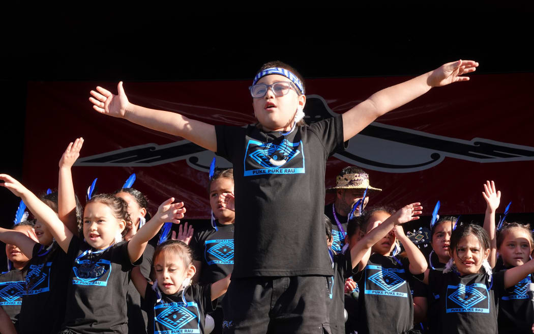 Tēina (juniors) from Moerewa School perform on the main stage.