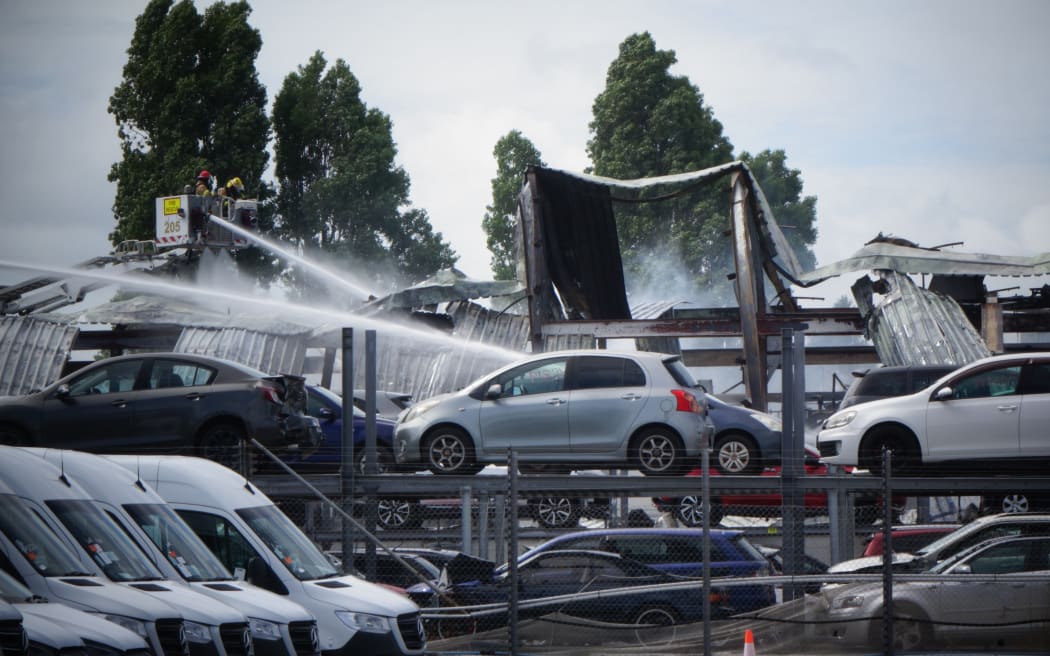 Firefighters at the site of a fire at Wiri, Auckland.