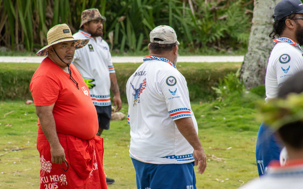 Tumua Pasilio, Egelani vice-president, acts as one of four umpires for the day.