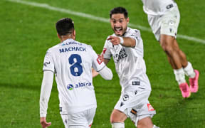 Zinédine Machach of Melbourne Victory celebrates his goal against Auckland FC with Bruno Fornaroli. 24 May, 2025.
