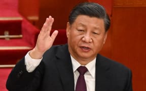 China's President Xi Jinping attends the closing ceremony of the 20th Chinese Communist Party's Congress at the Great Hall of the People in Beijing on October 22, 2022. (Photo by Noel CELIS / AFP)