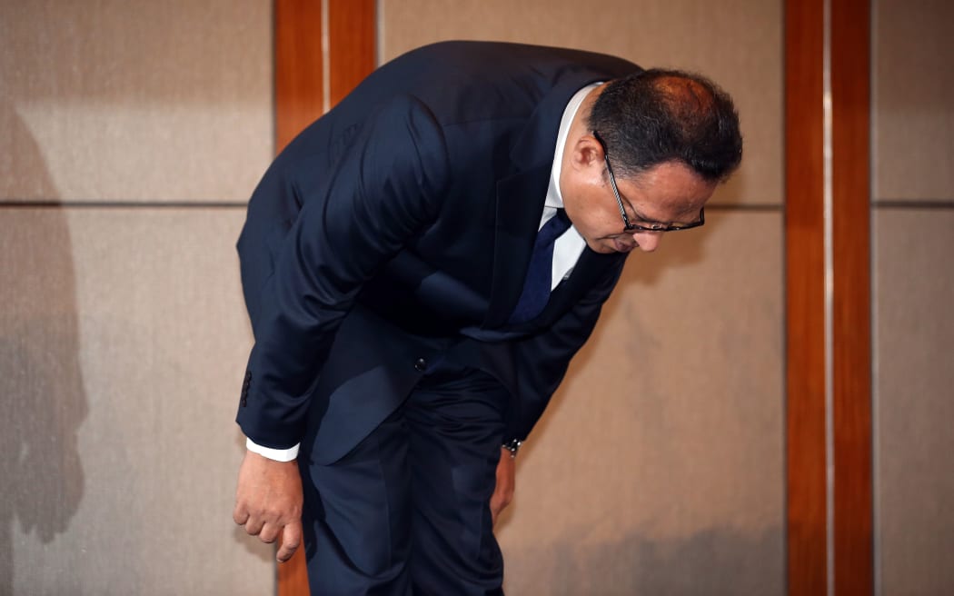 Atar Safdar, the head of Oxy Reckitt Benckiser Korea, bows during the press conference announcing the apology.